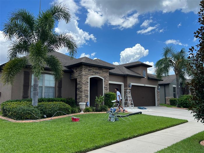 How much does it cost to paint a house in Lutz or Tampa?